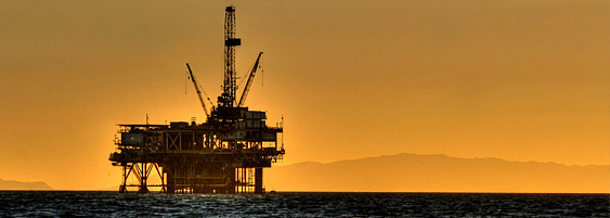 Oil rig at sunset