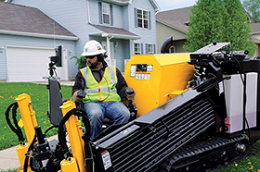 worker on land drill