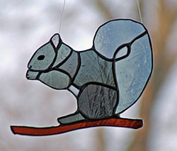 Copper and glass squirrel.