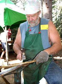Greg Wilbur teaching a class in metalsmithing.