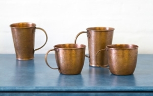 Carson Sio handhammered copper mugs.