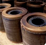 a row of finished copper motor rotors