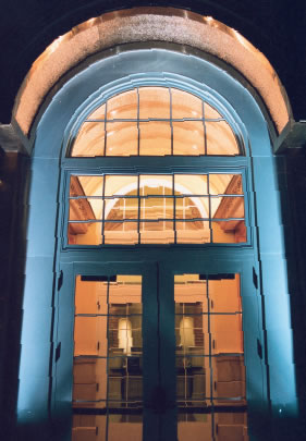 The pebble-textured copper ceiling in the entrance foyer.