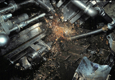 Small fragmented machining chips literally fly away from the cutting tool during high-speed machining of Free-Cutting Brass.