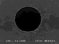 Ink jet printer cartridge hole, 50 µm in diameter, drilled using a CVL laser