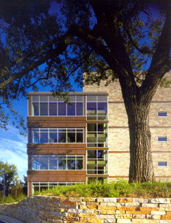 Figure 1. Copper together with clear glass,wraps the place facades from stair to stair.